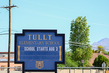 Sign: Tully Elementary School.  School Starts Aug 3.