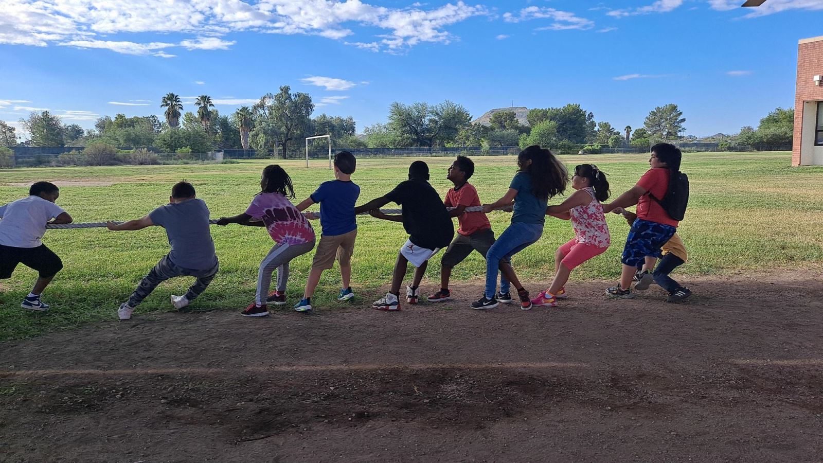 Tully students play tug of war during community time.